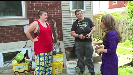 Woman Catches Masked Man with Knife Peeking Through Her Window
