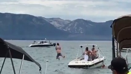 Aaron Rodgers LAUNCHES perfect pass to fan on a boat
