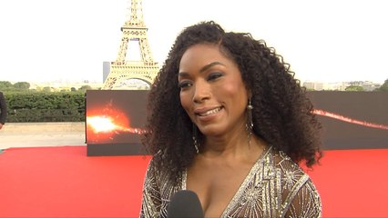 Angela Bassett Is Interrupted By Tom Cruise At Paris Premiere