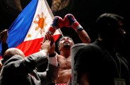 Pacman packs a punch, wins WBA Welterweight title