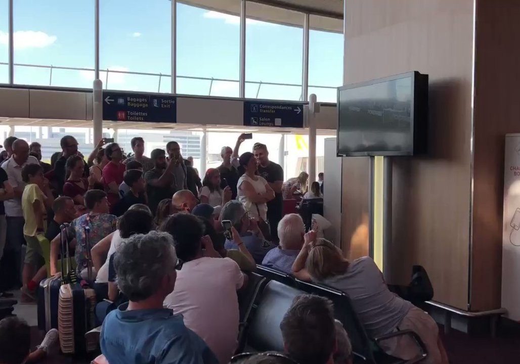 Travelers Celebrate France World Cup Win From Charles de Gaulle Airport