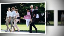 Donald Trump and first lady Melania Trump walk on the tarmac at Morristown Municipal Airport