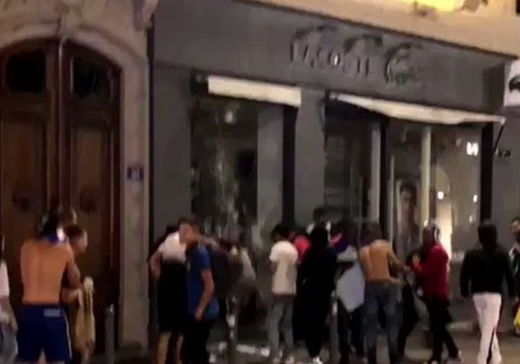 Looters Ransack Sports Shop in Lyon After France World Cup Victory