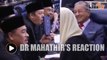 Dr Mahathir smiles as opposition MPs stage walkout