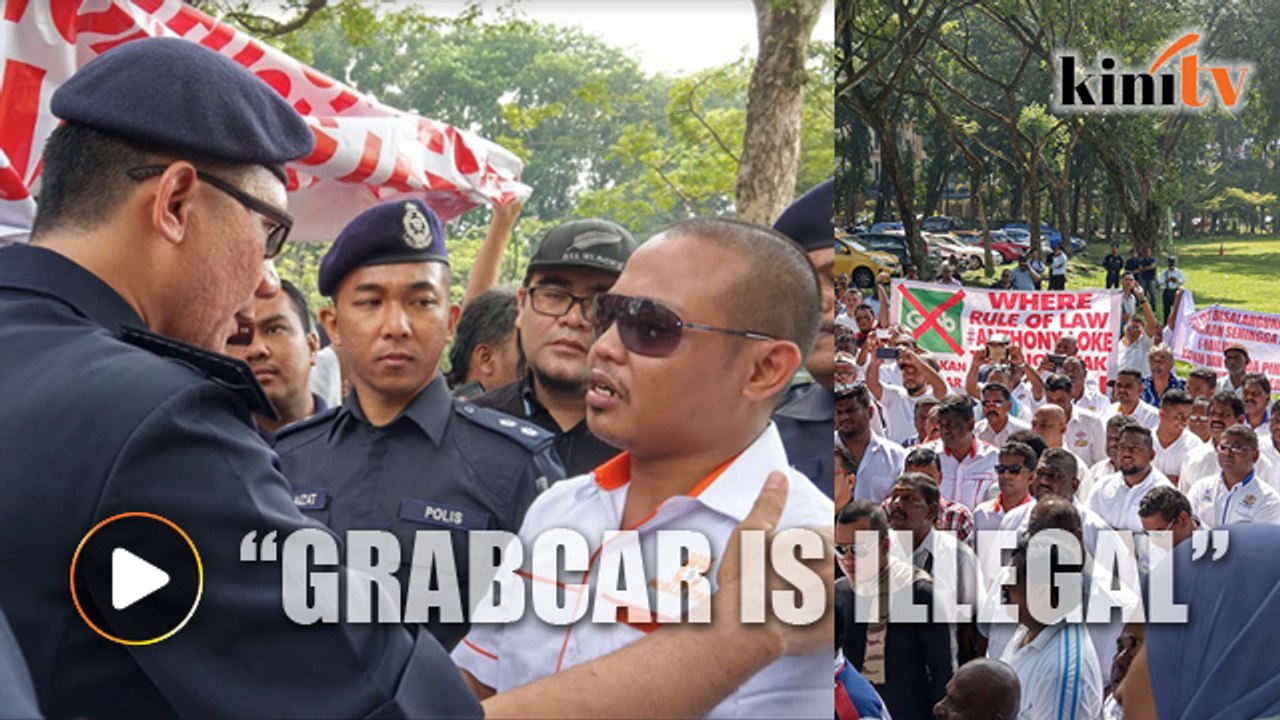 Taxi drivers protest near Parliament, furious over Grab