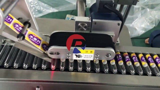 Reliance glass tube labeling machine, automatic pen labeler machine