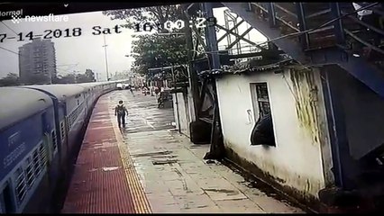 Hero cop risks life to save passenger dangling from train door