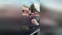 It's so hot in China that a man got stuck in melted tarmac trying to cross the road