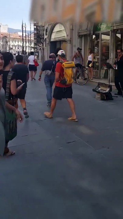Beautiful Girl Become Crazy to Dance When Street Musician Playing Violin