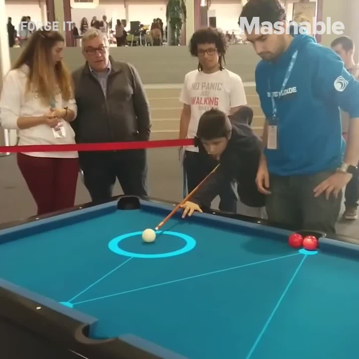 Playing pool with this trusty augmented reality projector should be the only way it's done from now on