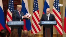 Putin Deflects Serious Questions By Giving A Soccer Ball For Baron Trump