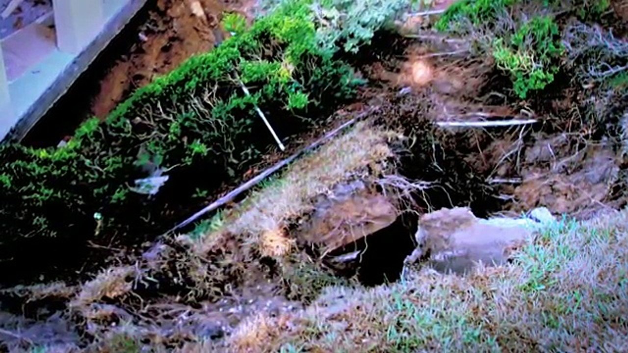 House Crashes Down After Succumbing to Sinkhole