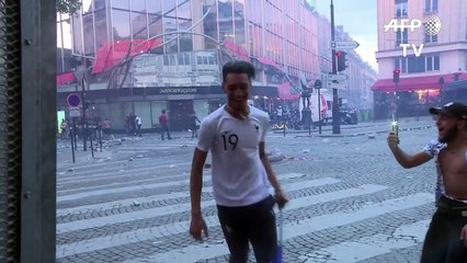Celebrations turn violent in Paris after France-s World Cup win
