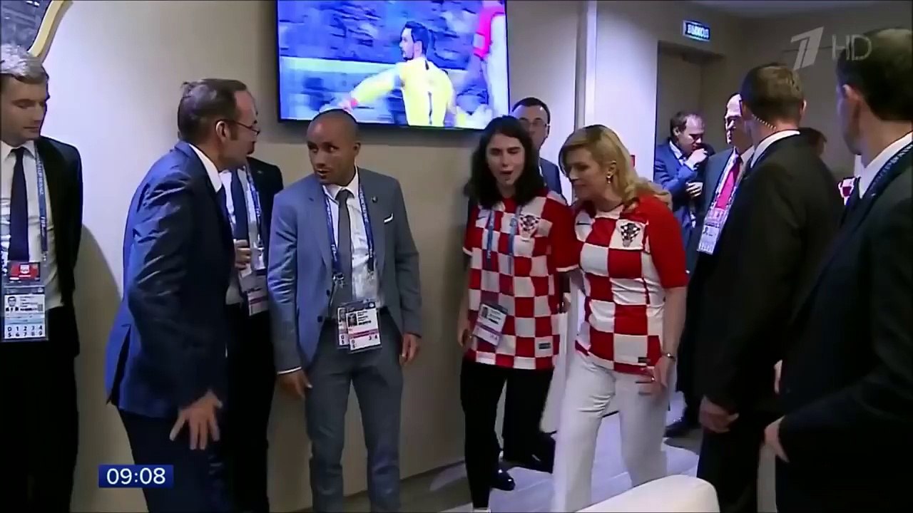 Presidents of Croatia and France kiss not on protocol World Cup final.