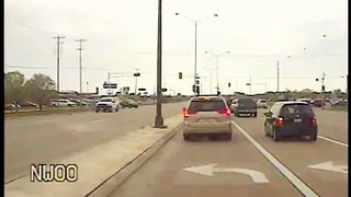 Police Officer stops traffic for ducks crossing the road in Eau Claire / USA