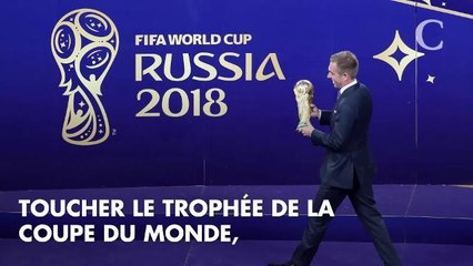 PHOTOS. Pamela Anderson : la compagne d'Adil Rami a elle aussi touché la Coupe du monde avec un sourire XXL