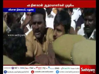 Dinakaran supporters attack OPS loyalists at Madurai airport