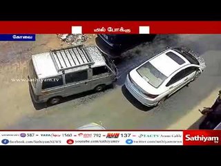 மேம்பாலத்தில் இருந்து தார் டிரம் கிழே விழுந்து விபத்து : தார் கொட்டியதில் கார் சேதம்