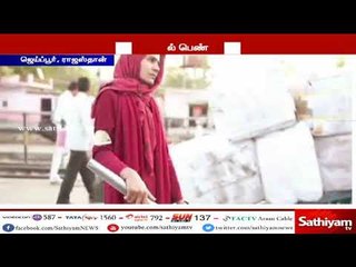 ஜெய்ப்பூர் ரயில் நிலையத்தில் சுமை தூக்கும் தொழிலாளியாக பணி புரியும் பெண் ஒருவர்