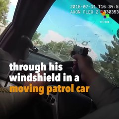 Cop Shoots Suspects Through Driving Vehicle
