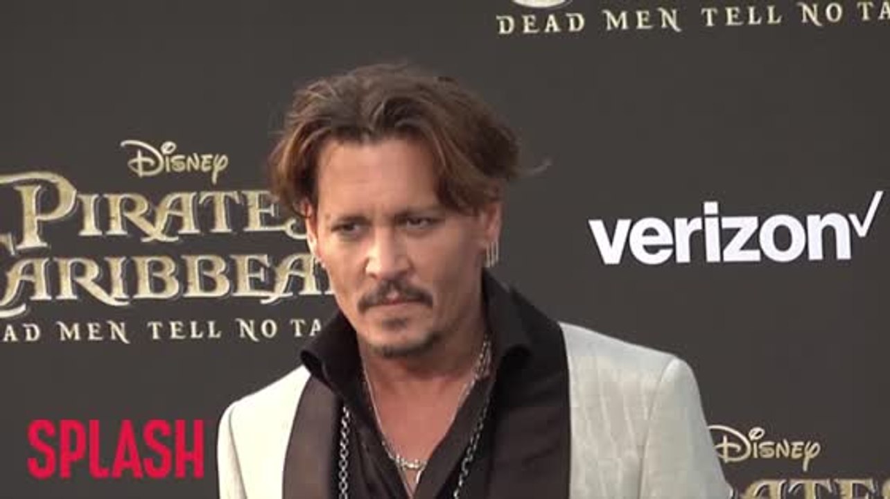 Johnny Depp settles with former managers