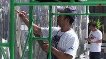 WATCH: More than 300 artists in Chiang Rai have created a giant painting to commemorate the Thailand cave rescue operation.A two-metre tall sculpture of Saman