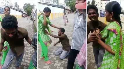 கோவில் வாசலில் கணவனை அடித்து துவம்சம் செய்த மனைவி- வீடியோ