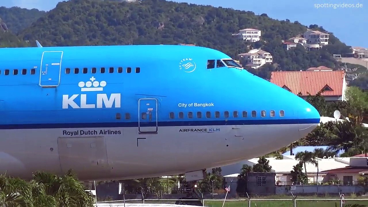 WOW KLM 747 Extreme Jet Blast blowing People away at Maho Beach, St. Maarten