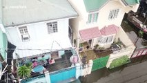 Drone footage reveals the Philippines city submerged by Typhoon Henry