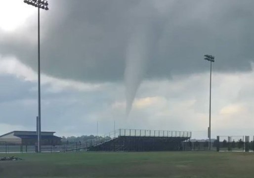 Funnel Clouds Loom Over High School in Iowa