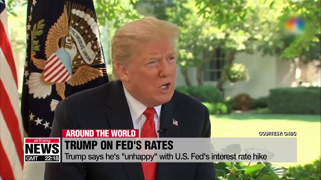 Trump says he's 'unhappy' with U.S. Fed's interest rate hike