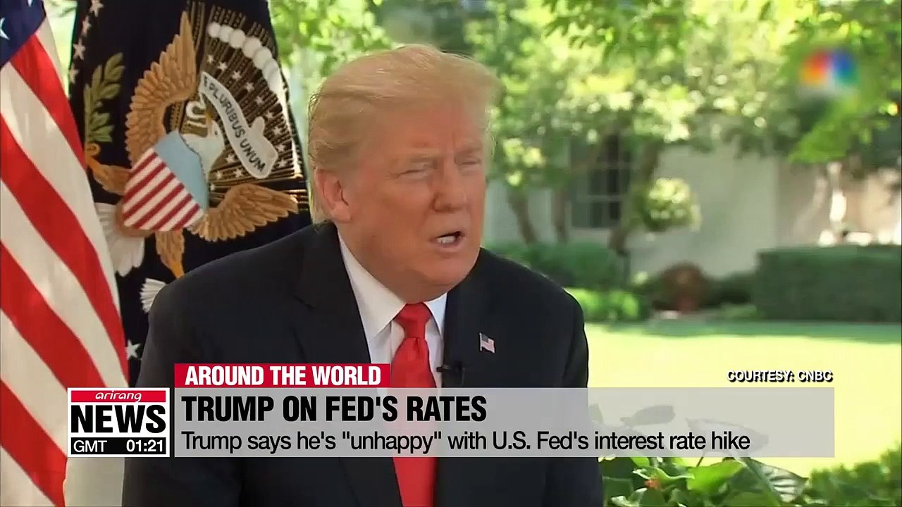 Trump says he's "unhappy" with U.S. Fed's interest rate hike