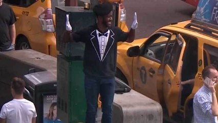 Nate Burleson mimes in Times Square after 'Pros' lose to 'Joes' in AFFL Ultimate Final