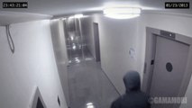 Security Camera Captures A Strange Figure Attacking A Man In A Hallway