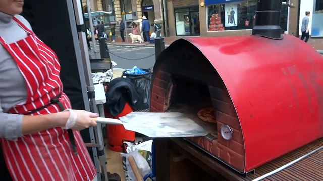 Delicious Italian Street Food by Woodfired Pizza Handmade on a mobile cycle oven