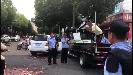 Furious fruit seller smashes watermelons to avoid punishment