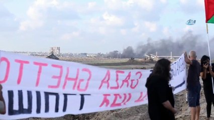 - Bir grup İsrailli aktivist Gazze sınırında Filistin bayrağı taşıdı