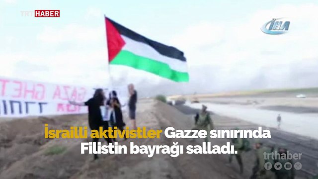 İsrailli aktivistler Gazze sınırında Filistin bayrağı taşıdı