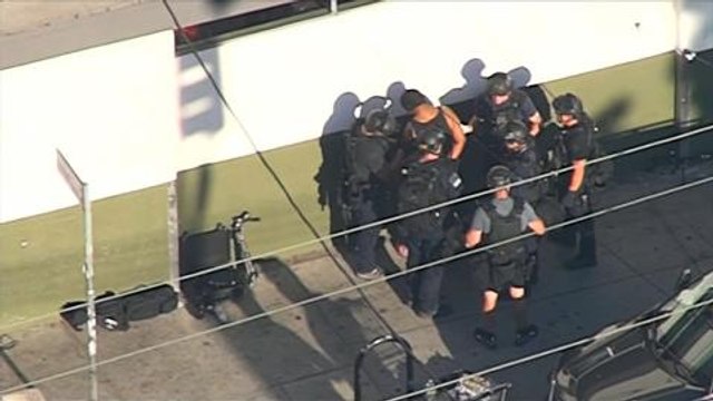 Gunman arrested after Los Angeles store hostage standoff