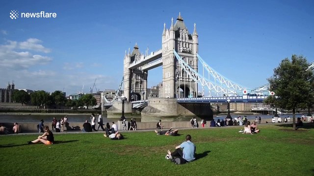 Londoners bake underneath the hot sun during heatwave