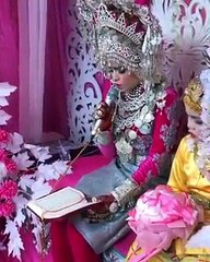 PENGANTIN perempuan melantunkan ayat suci alqur'an dengan suara merdu
