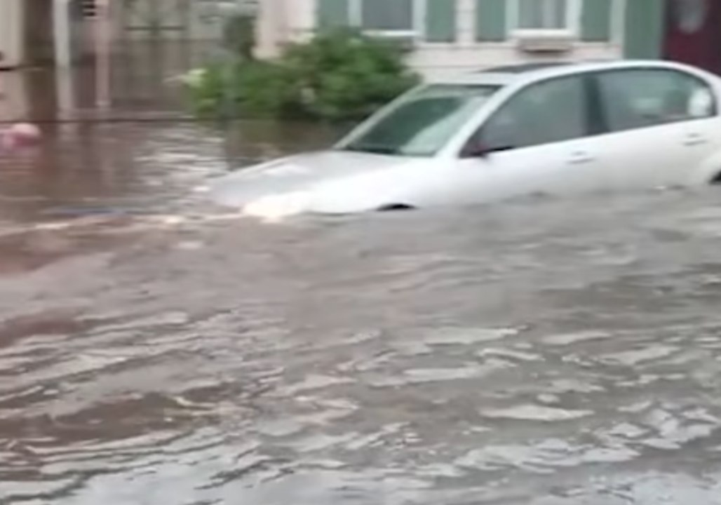 Floodwaters Threaten to Submerge Cars in Tremont, Pennsylvania