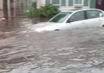 Floodwaters Threaten to Submerge Cars in Tremont, Pennsylvania