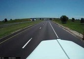 Truck Dash Cam Captures Scary Moment When Shed Flies Across Highway