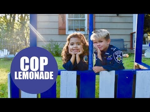 Lad desperate to be a police officer set up a stall serving lemonade and donuts to cops