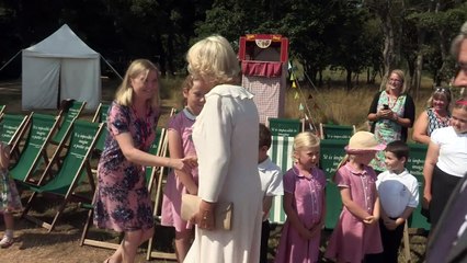 Camilla and Dame Judy Dench eat ice-cream at Osborne House