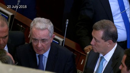 Colombia's Ex-President Uribe resigns from senate to defend name