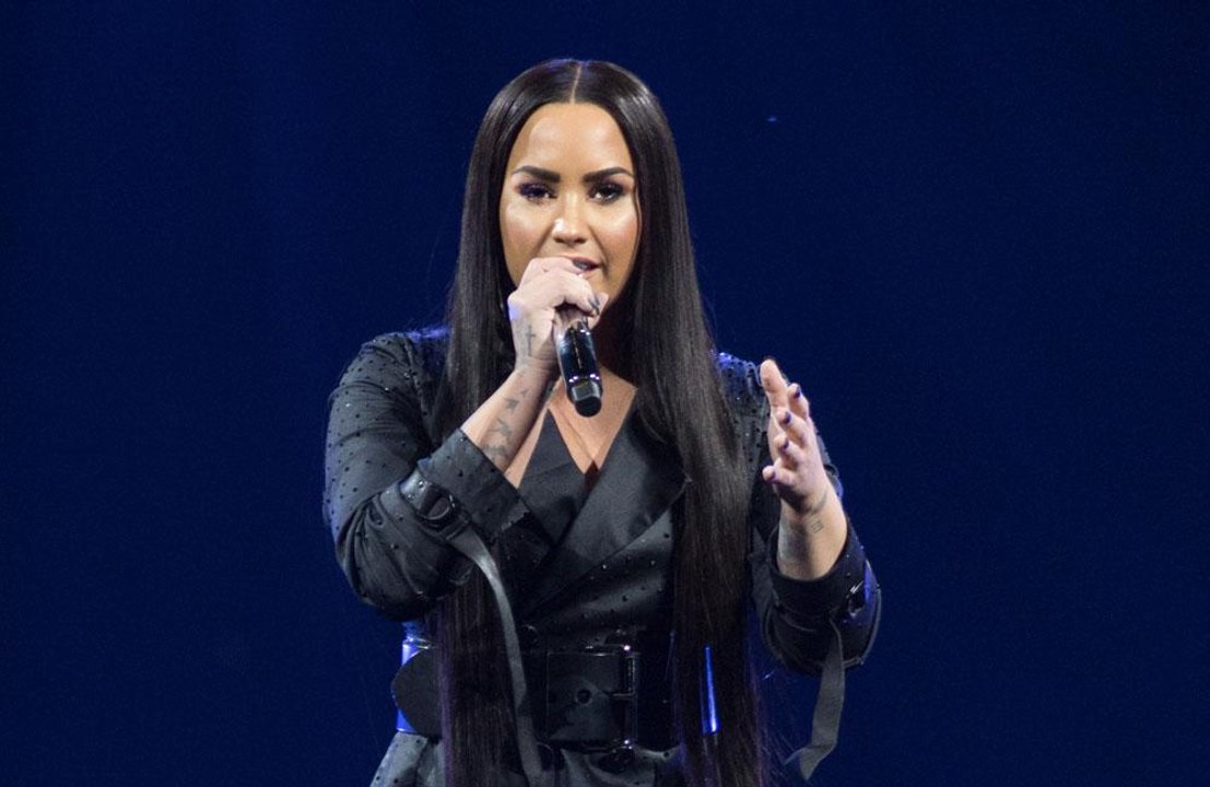 Demi Lovato is 'awake and with family'