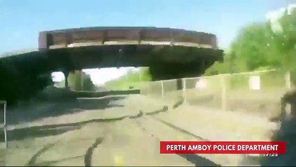 Watch Police Officer Run To Save Man From Approaching Train