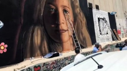 - Filistinli Sanatçılar, Ayrım Duvarı’na “Cesur Kız” Tamimi'nin Resmini Çizdi